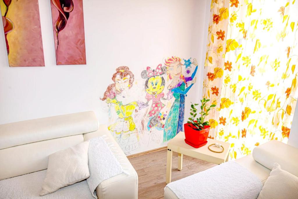 A seating area at Happy stories' apartment in city centre