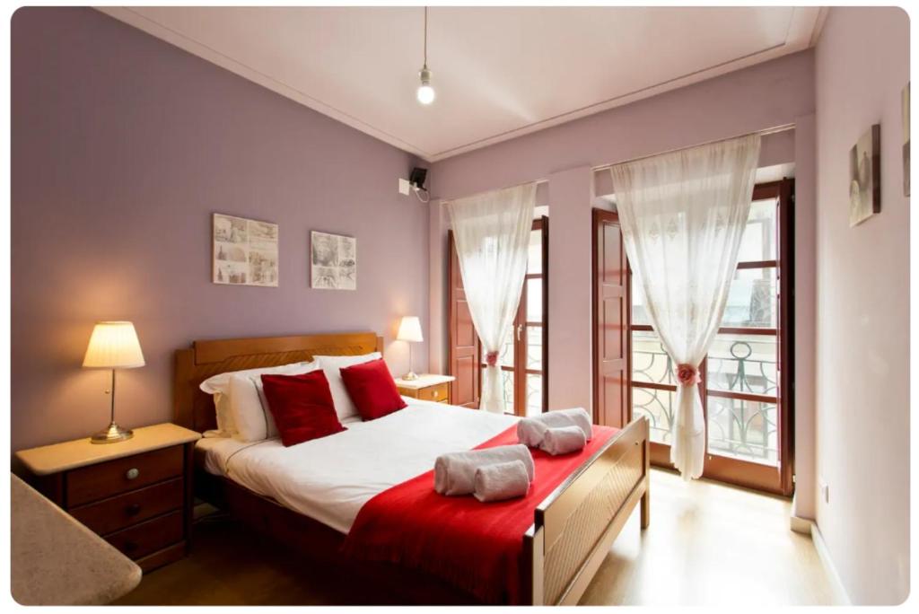 Postel nebo postele na pokoji v ubytování Porto Village Inn