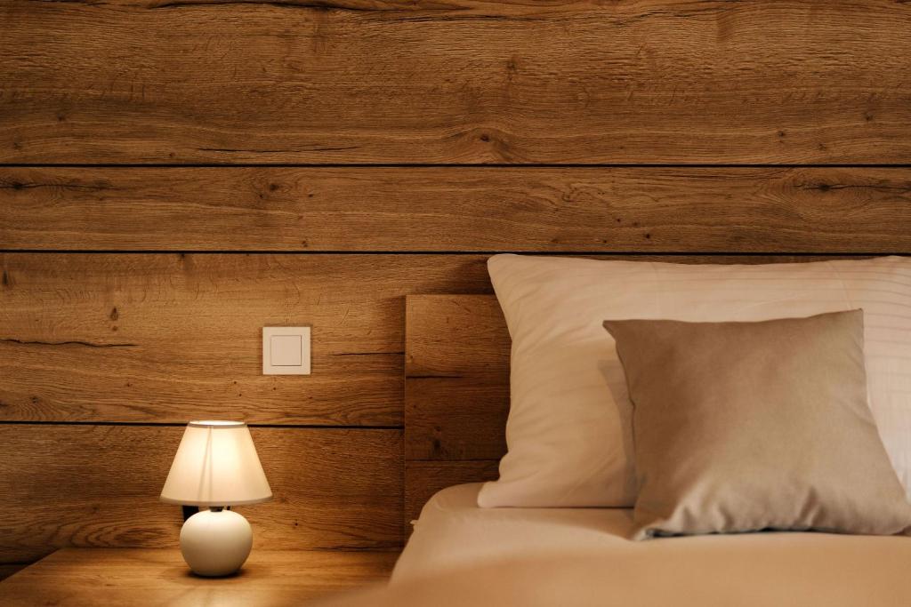 Postel nebo postele na pokoji v ubytování Villa Greystone