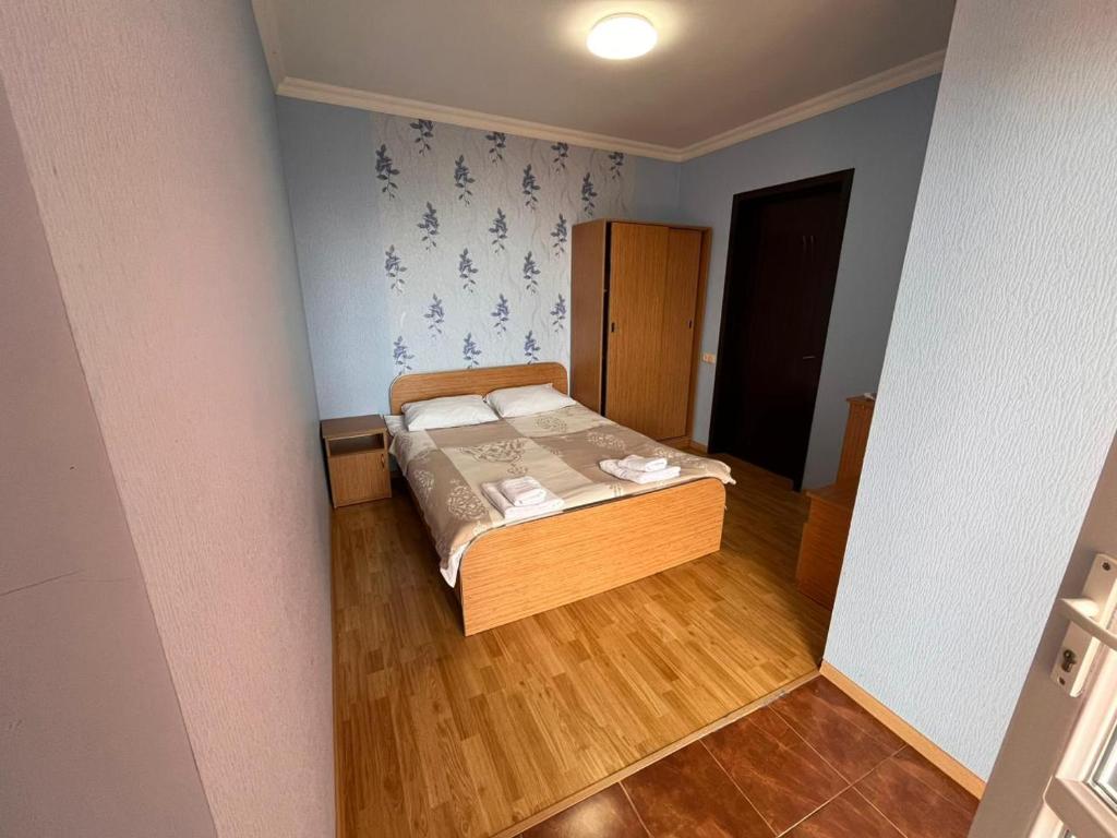 Llit o llits en una habitació de Kvariati - Guest House