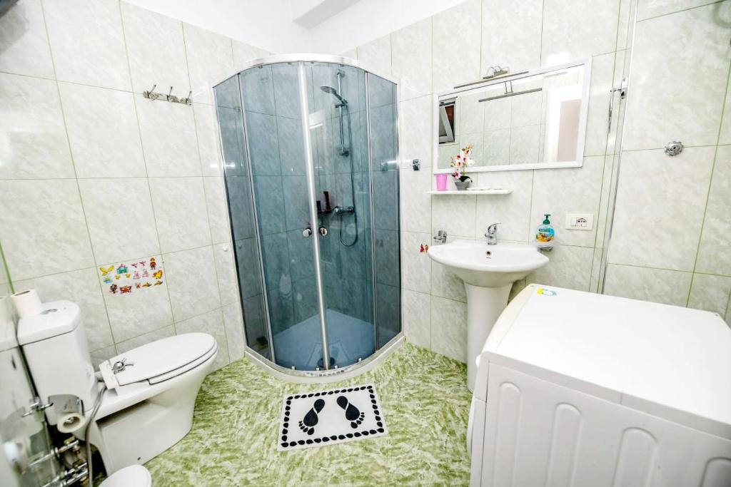 A bathroom at Happy stories' apartment in city centre