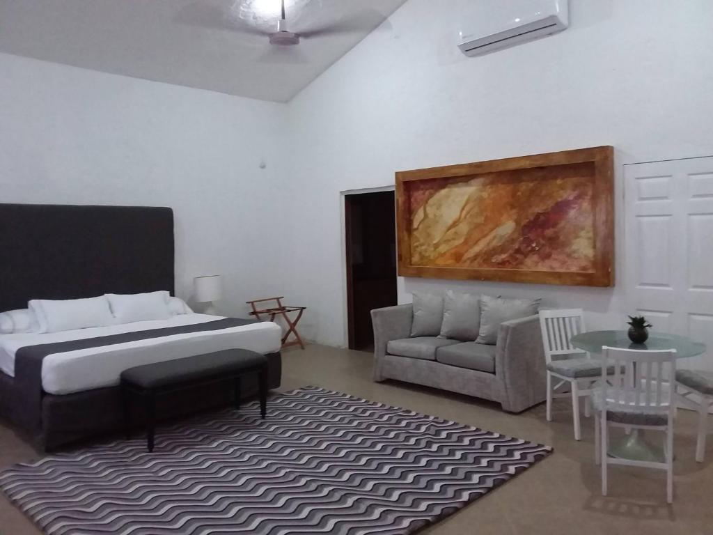 Postel nebo postele na pokoji v ubytování Junior suite Privada 7 min del Aeropuerto