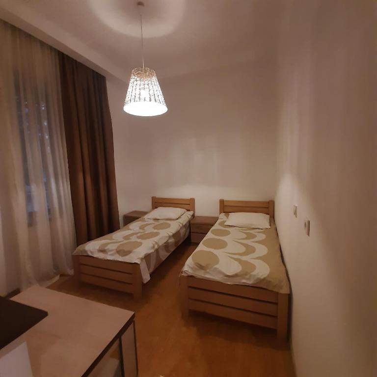 Postel nebo postele na pokoji v ubytování Sanli