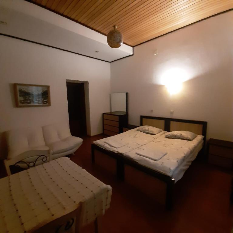 Postel nebo postele na pokoji v ubytování Sanli