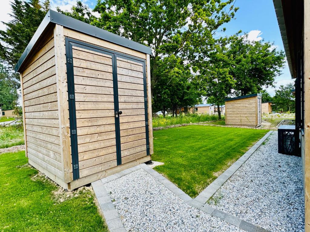 Vonkajšia záhrada v ubytovaní Le COTTAGE Baulois-Entre MER et NATURE- PISCINE