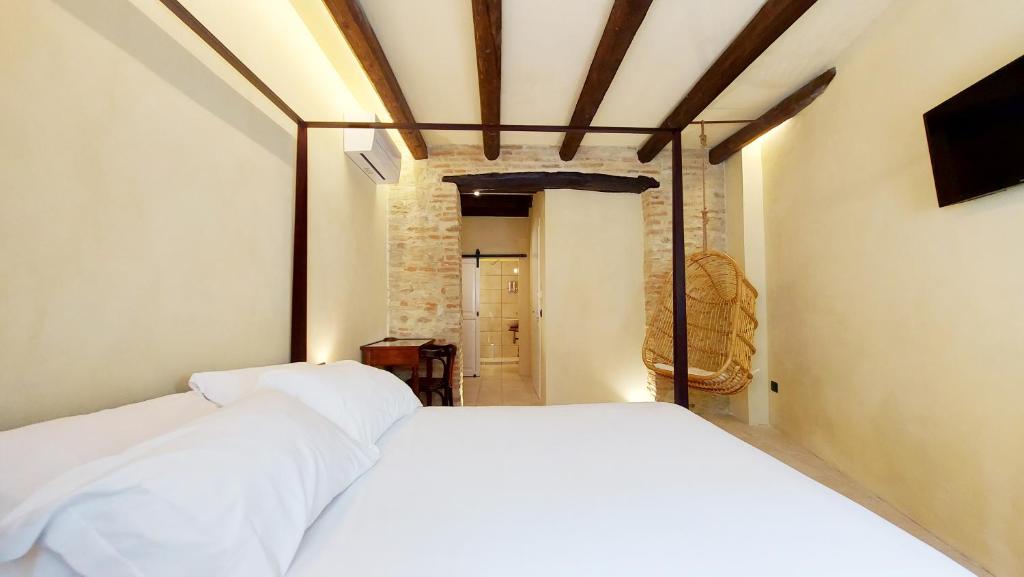 Postel nebo postele na pokoji v ubytování CASA OCRA