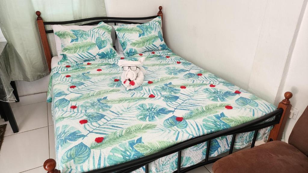 Postel nebo postele na pokoji v ubytování Caribbean Dream CD5