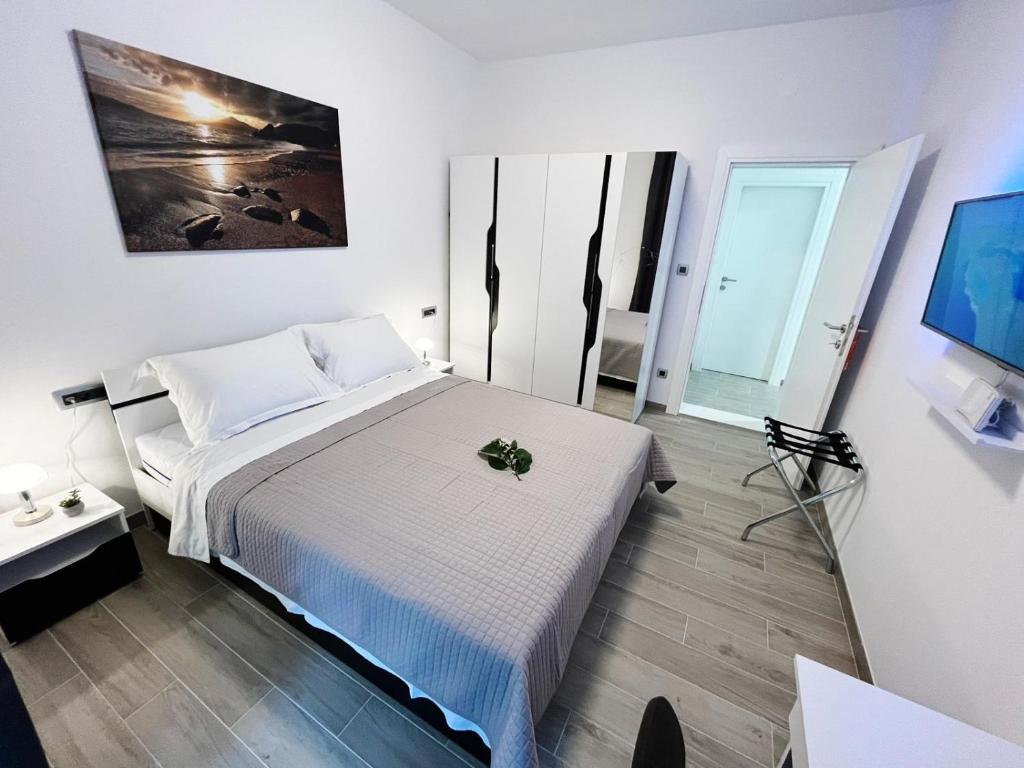Posteľ alebo postele v izbe v ubytovaní Apartments T&T