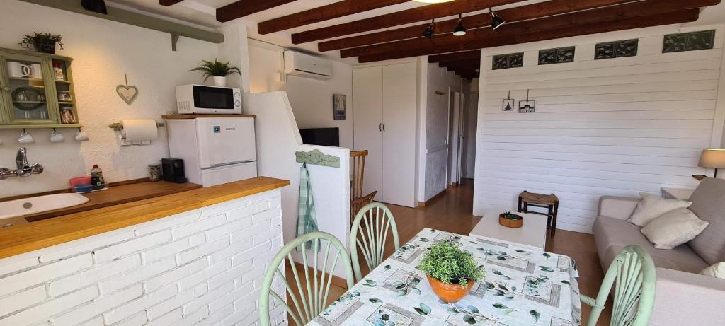 Kuchyň nebo kuchyňský kout v ubytování Apartamento Calella Home
