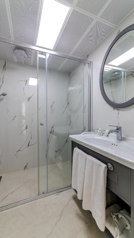 Ванная комната в Motto Premium Hotel&Spa