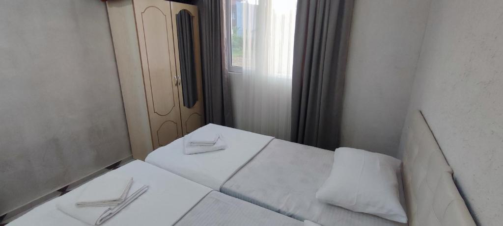Postel nebo postele na pokoji v ubytování ოცნების სახლი dream house
