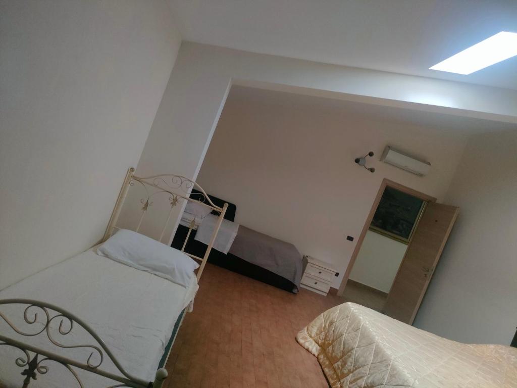 Uma cama ou camas num quarto em BnB benvenuto a Summonte Avellino