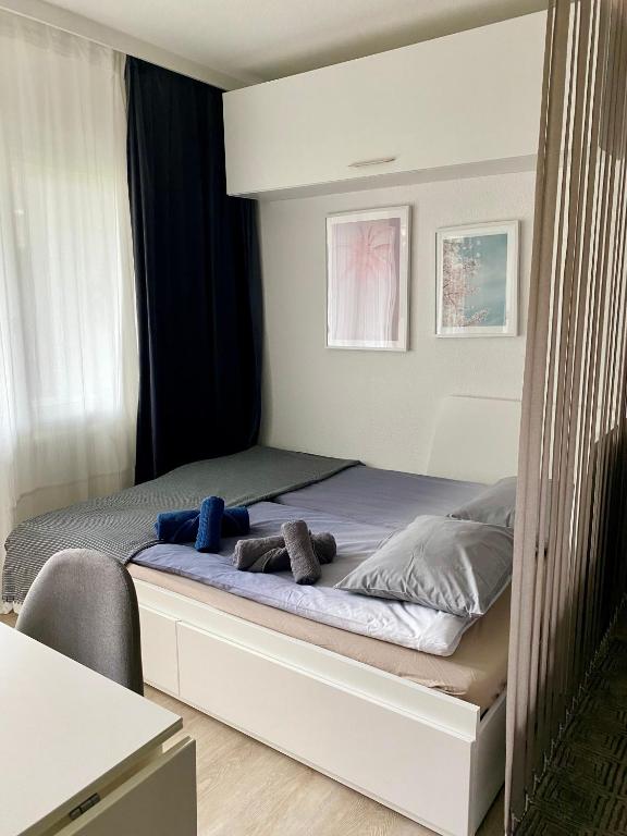 Postel nebo postele na pokoji v ubytování Studio 4pers aux Bains de Saillon