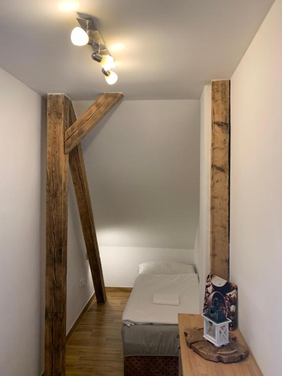Postel nebo postele na pokoji v ubytování Apartmány Bolevec Plzeň pro rodiny s dětmi a zvířátky
