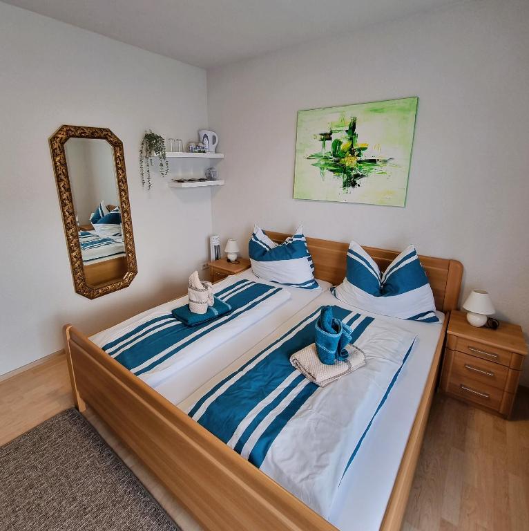Postel nebo postele na pokoji v ubytování Gästehaus Rettl