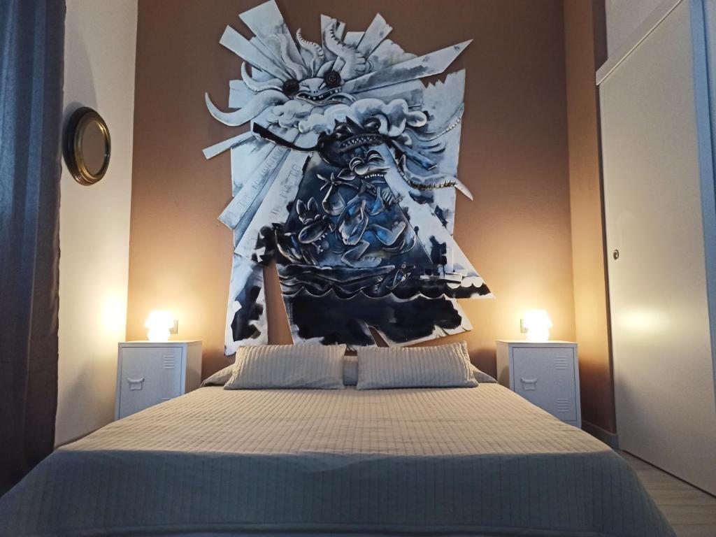 Postel nebo postele na pokoji v ubytování BB Arcana