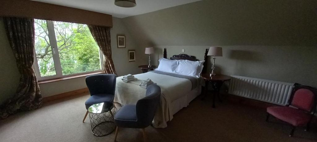 Postel nebo postele na pokoji v ubytování Ardsallagh Lodge
