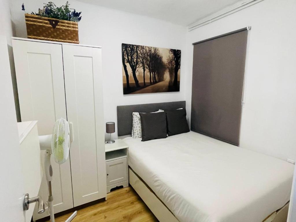 Posteľ alebo postele v izbe v ubytovaní Beach Apartment Barca 6