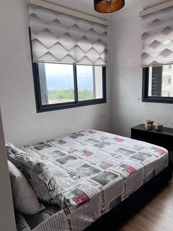 Postel nebo postele na pokoji v ubytování Coin Confort 2 chambres de luxe avec piscine