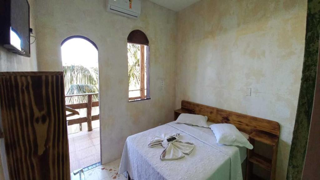 Postel nebo postele na pokoji v ubytování Beleza Natural Pousada