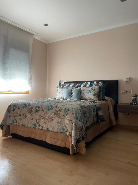 Posteľ alebo postele v izbe v ubytovaní Apartamento D'As Baladas