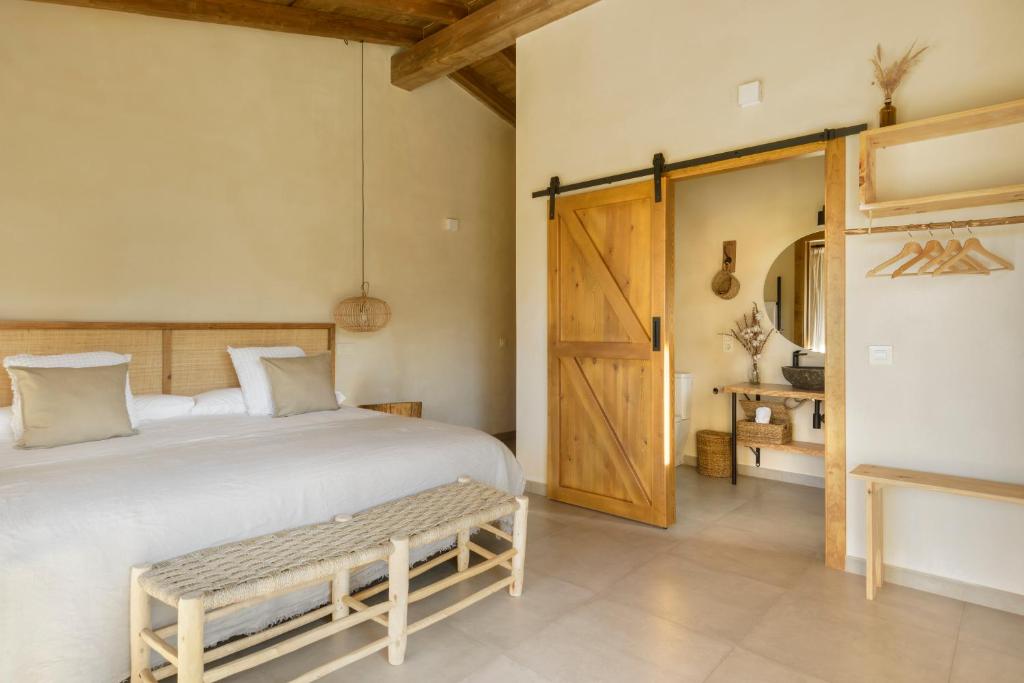 Postel nebo postele na pokoji v ubytování Cerrás Agroturismo