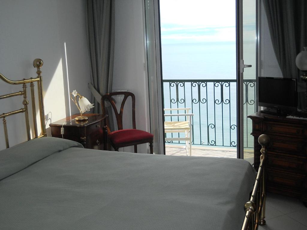 Postel nebo postele na pokoji v ubytování Hotel Leopold