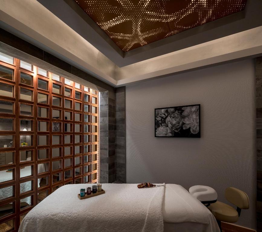 Postel nebo postele na pokoji v ubytování Condado Vanderbilt Hotel