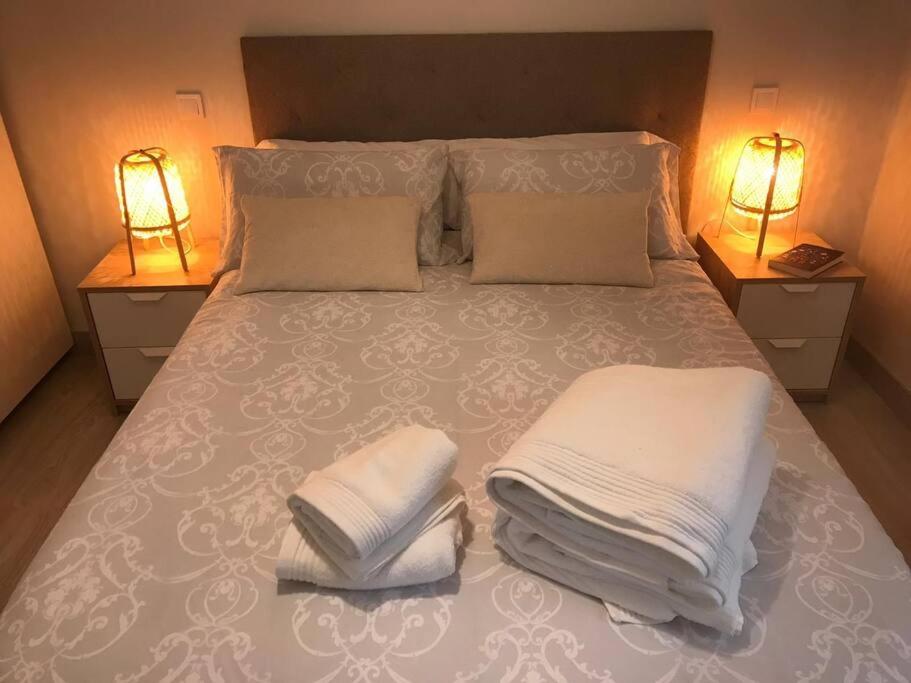 Postel nebo postele na pokoji v ubytování sweethomesantander