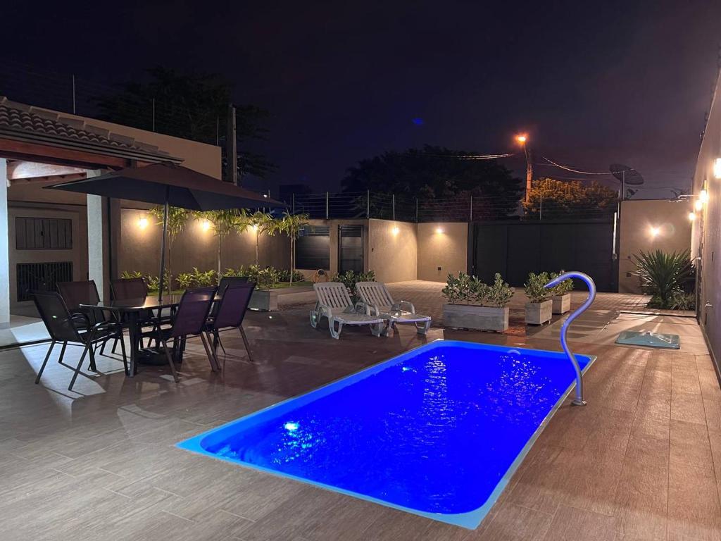 Bazén v ubytování Casa de Temporada Mouton nebo v jeho okolí