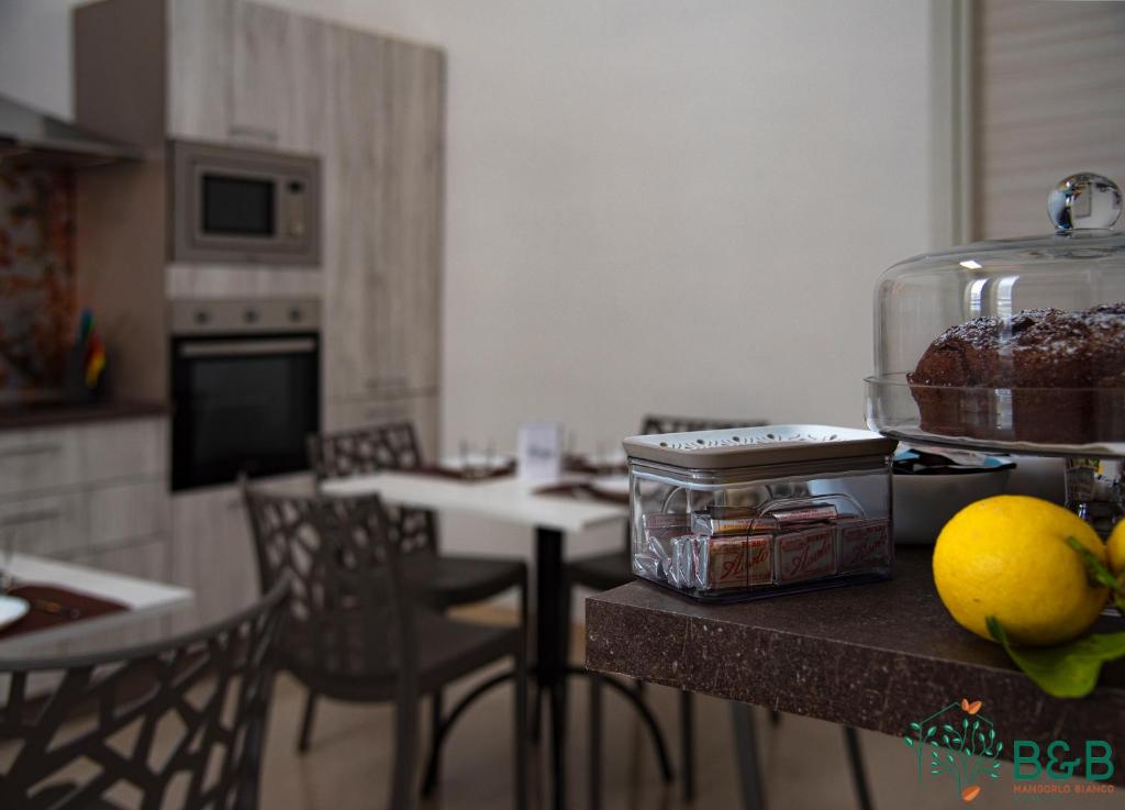 Kuchyň nebo kuchyňský kout v ubytování B&B MANDORLO BIANCO