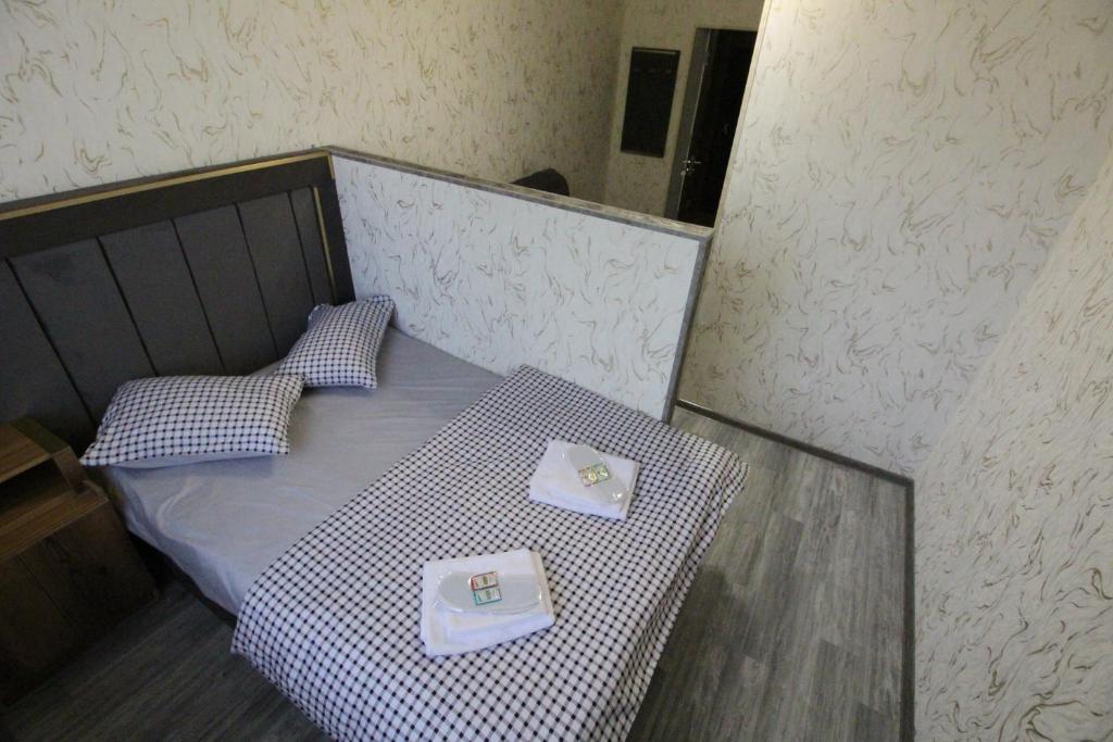 Postel nebo postele na pokoji v ubytování Oazis