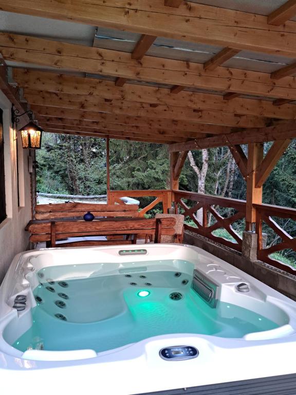 a jacuzzi tub in a cabin at House Franja - Spa and relax in Kranjska Gora