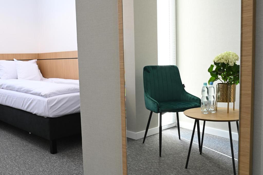 Letto o letti in una camera di Hotel Parrot