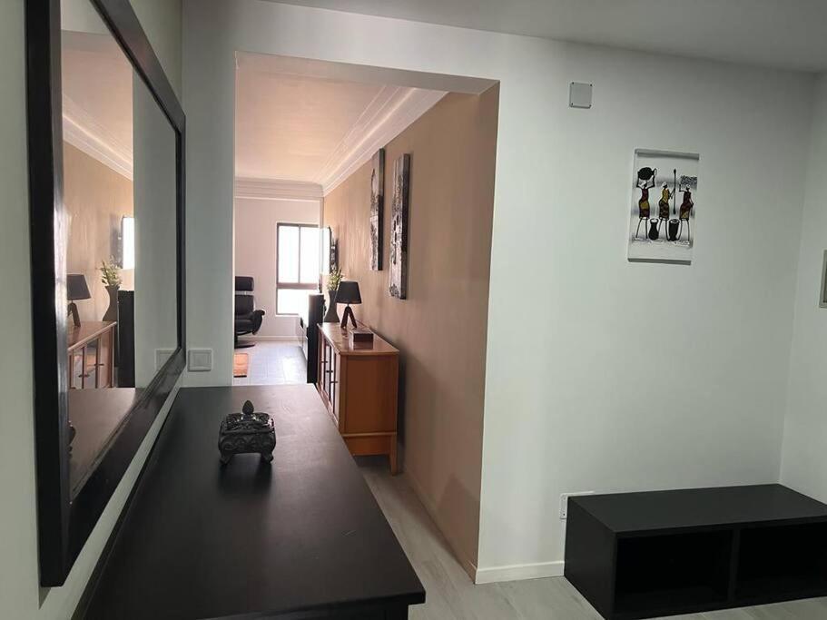 TV a/nebo společenská místnost v ubytování Praia Center