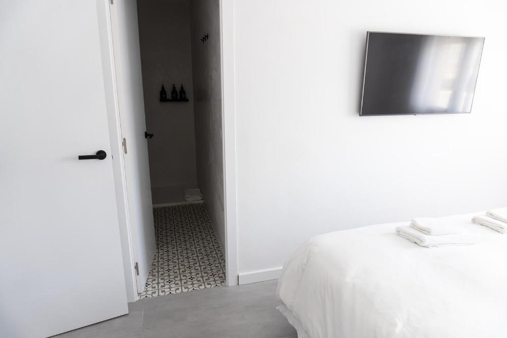 Posteľ alebo postele v izbe v ubytovaní Apartamento con Parking a 50m de la playa