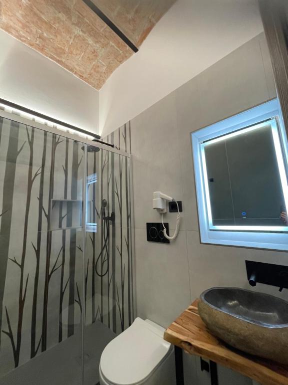 Koupelna v ubytování Hotel Felice