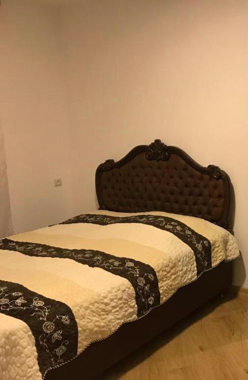 Postel nebo postele na pokoji v ubytování Zviad Guest House