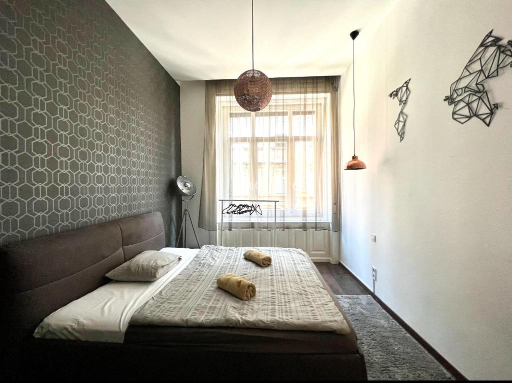 Posteľ alebo postele v izbe v ubytovaní Wonderful DESIGN Apartment In the City Centre