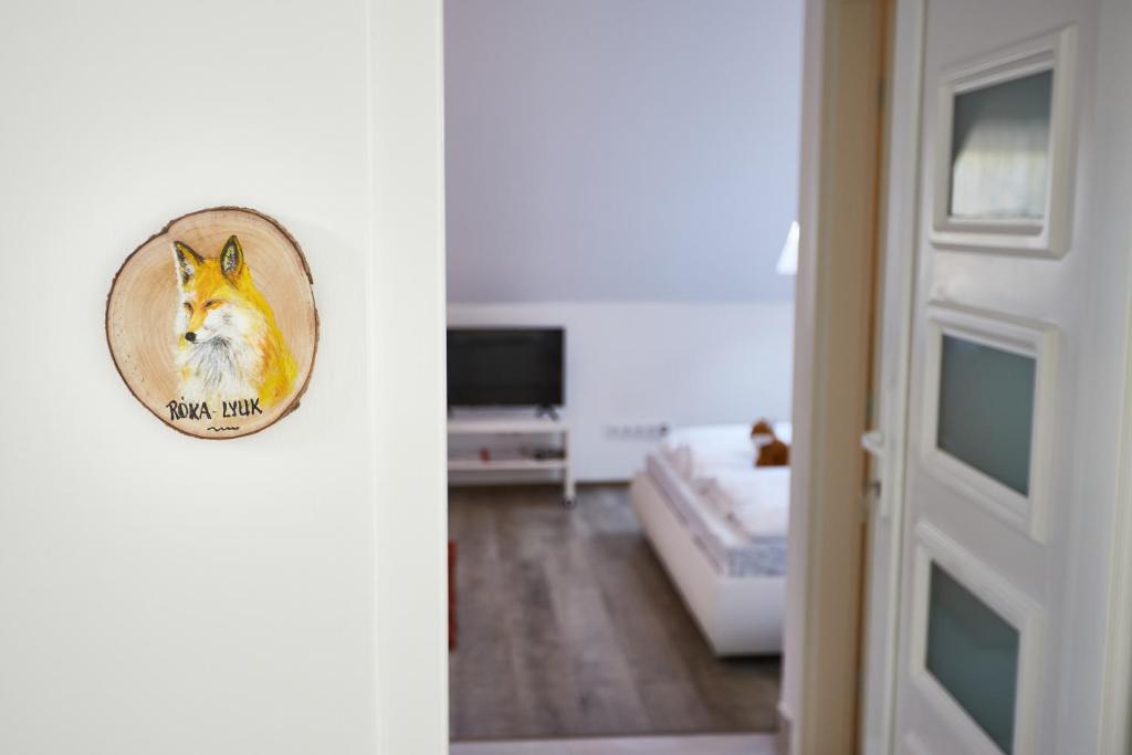 Postel nebo postele na pokoji v ubytování Rezeda Vendégház