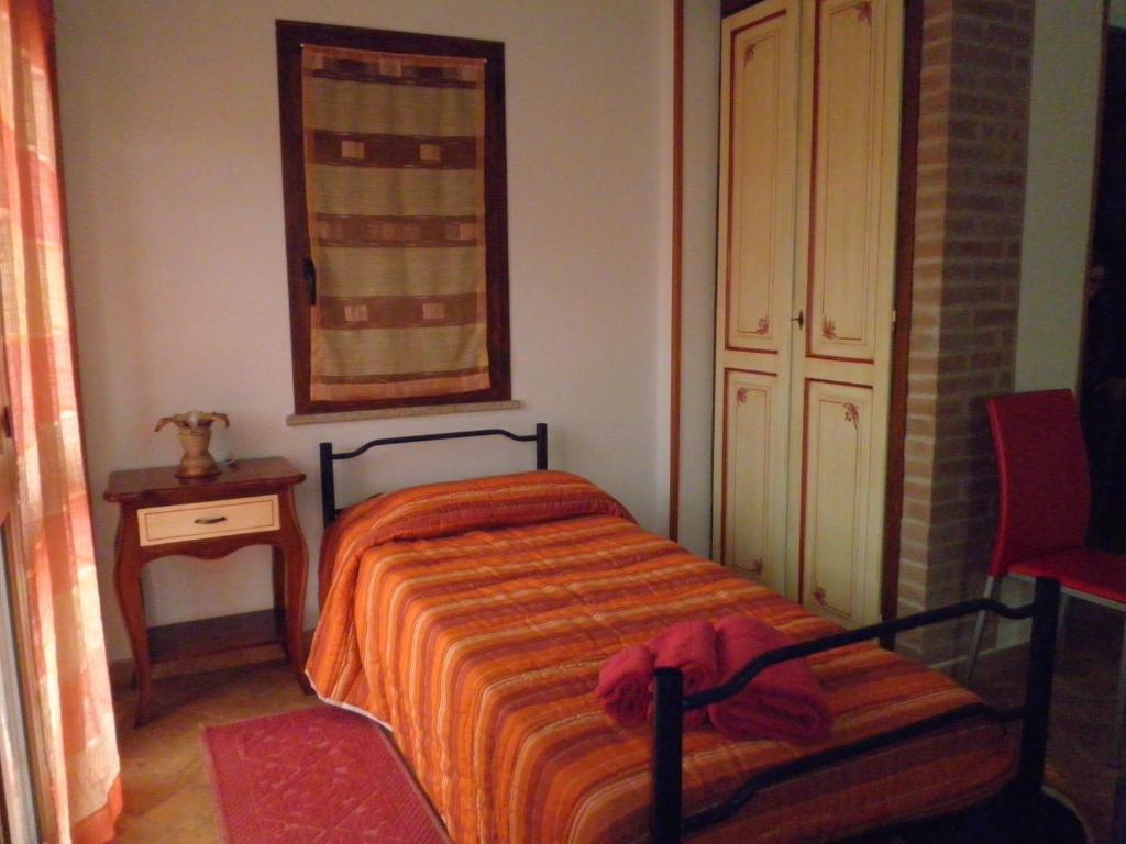 Postel nebo postele na pokoji v ubytování B&b Su Acu