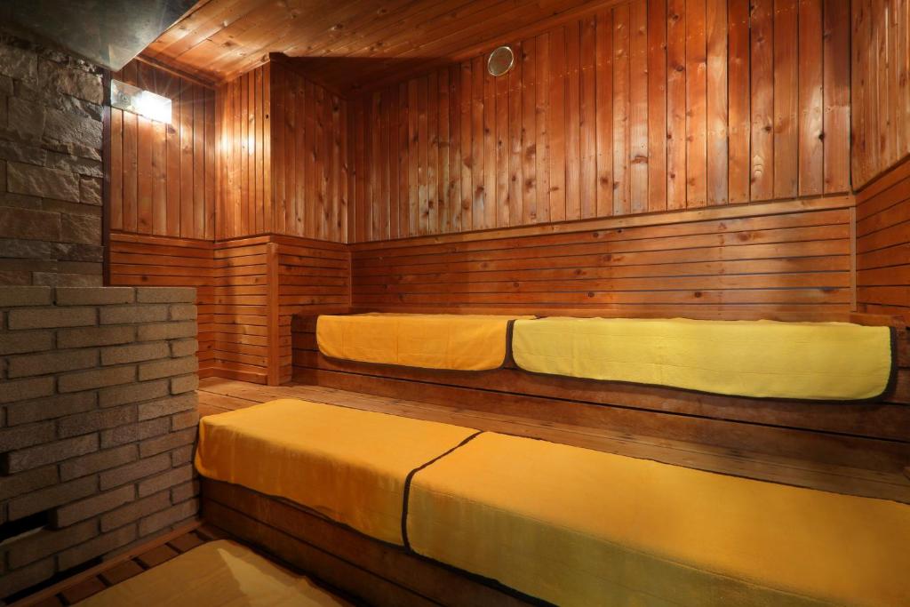 Postel nebo postele na pokoji v ubytování Hotel Sunshine Kinugawa