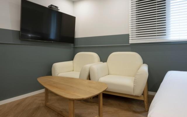 TV a/nebo společenská místnost v ubytování Hotel Yaja Gwangalli