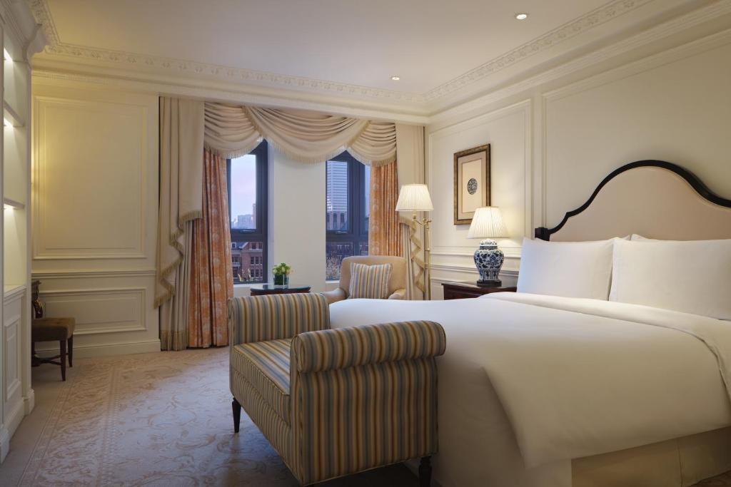 Postel nebo postele na pokoji v ubytování The Ritz-Carlton, Tianjin