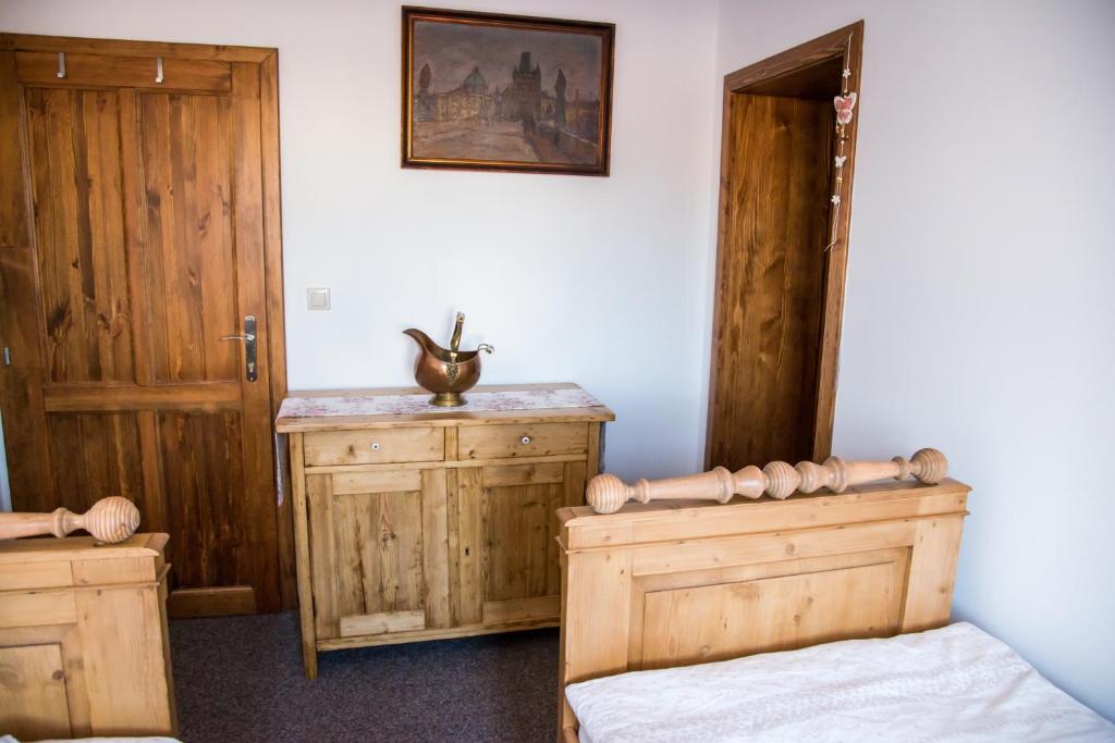 Postel nebo postele na pokoji v ubytování Penzion U Jindry