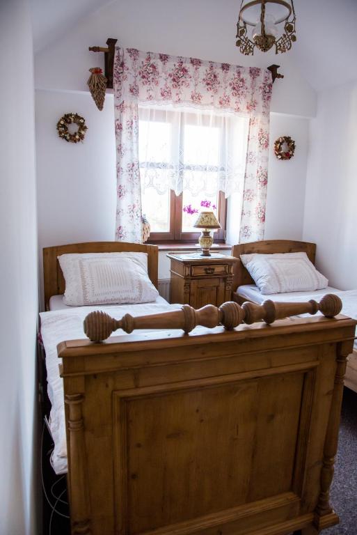 Postel nebo postele na pokoji v ubytování Penzion U Jindry