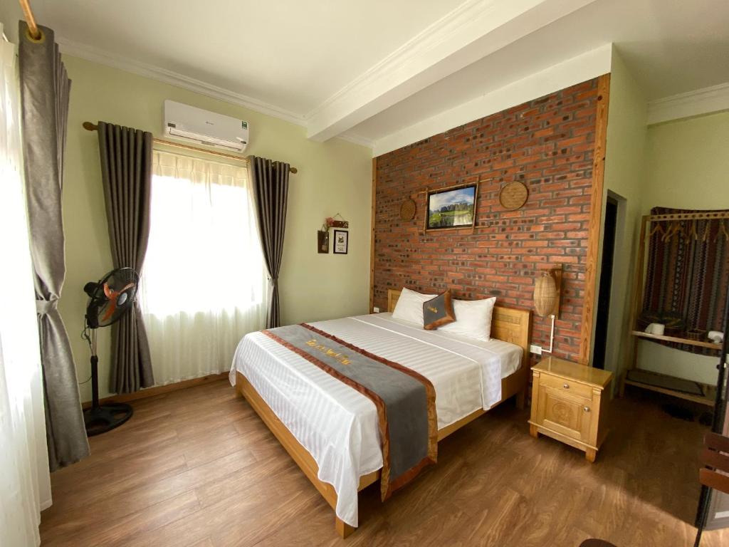 Postel nebo postele na pokoji v ubytování Tam Coc Sweet Home