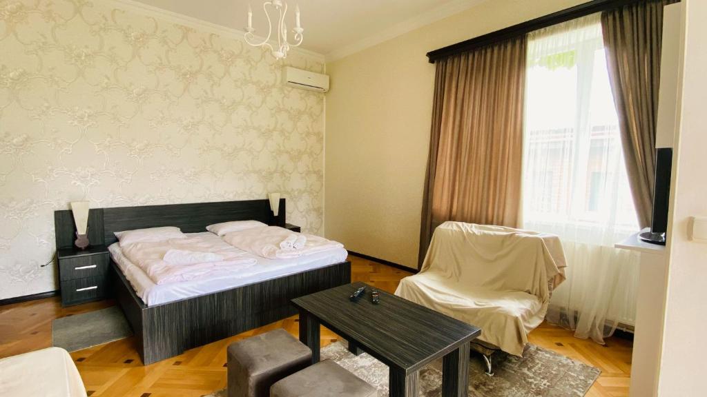 Postel nebo postele na pokoji v ubytování Neli & Zaal Guest House