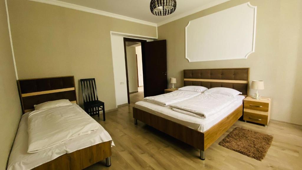 Postel nebo postele na pokoji v ubytování Neli & Zaal Guest House