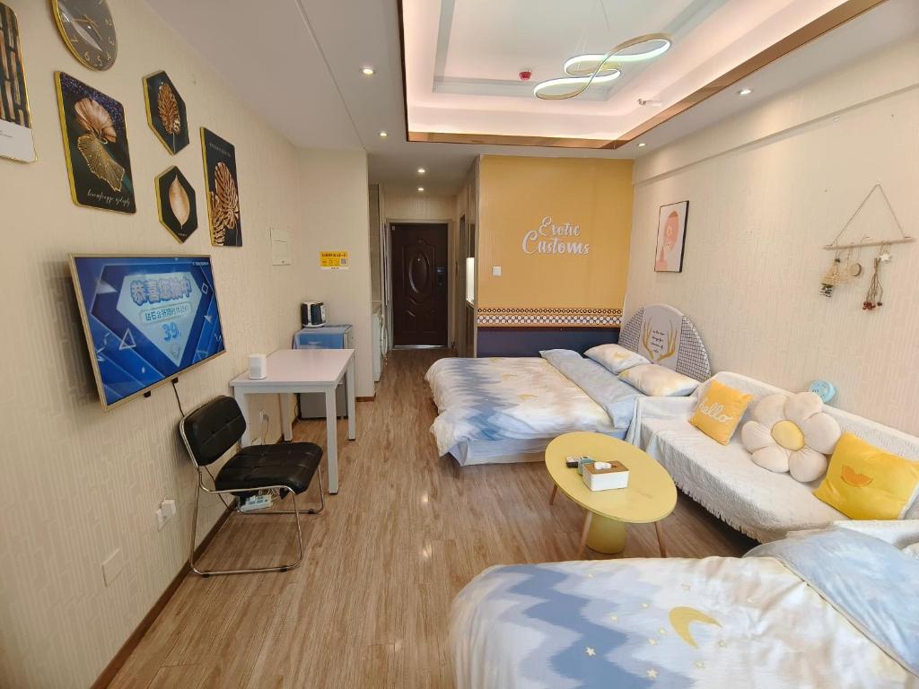 Postel nebo postele na pokoji v ubytování Yu Jing Xuan Boutique Apartment